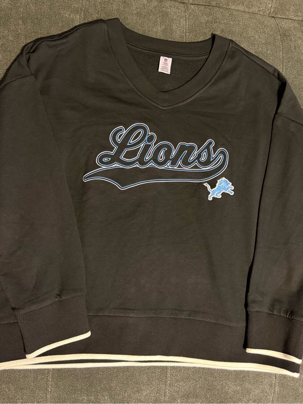 NFL Black V-Neck Sweater with Light Blue Embroidered Lions Logo NWOT